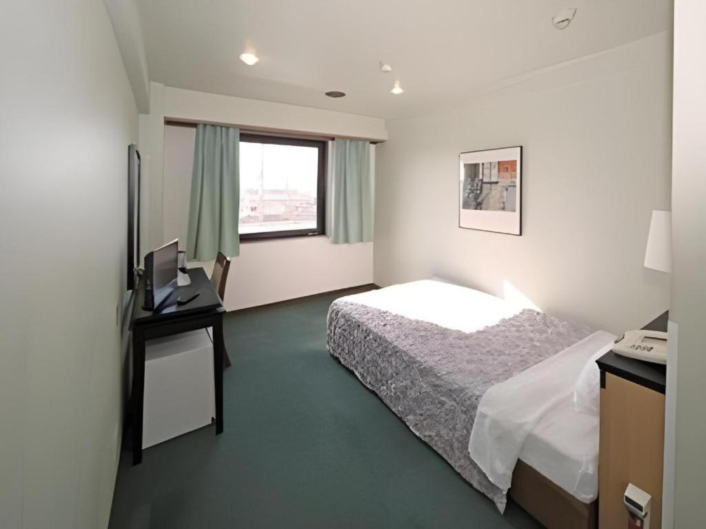 Hotel Yutaka Wing Izumisano Buitenkant foto