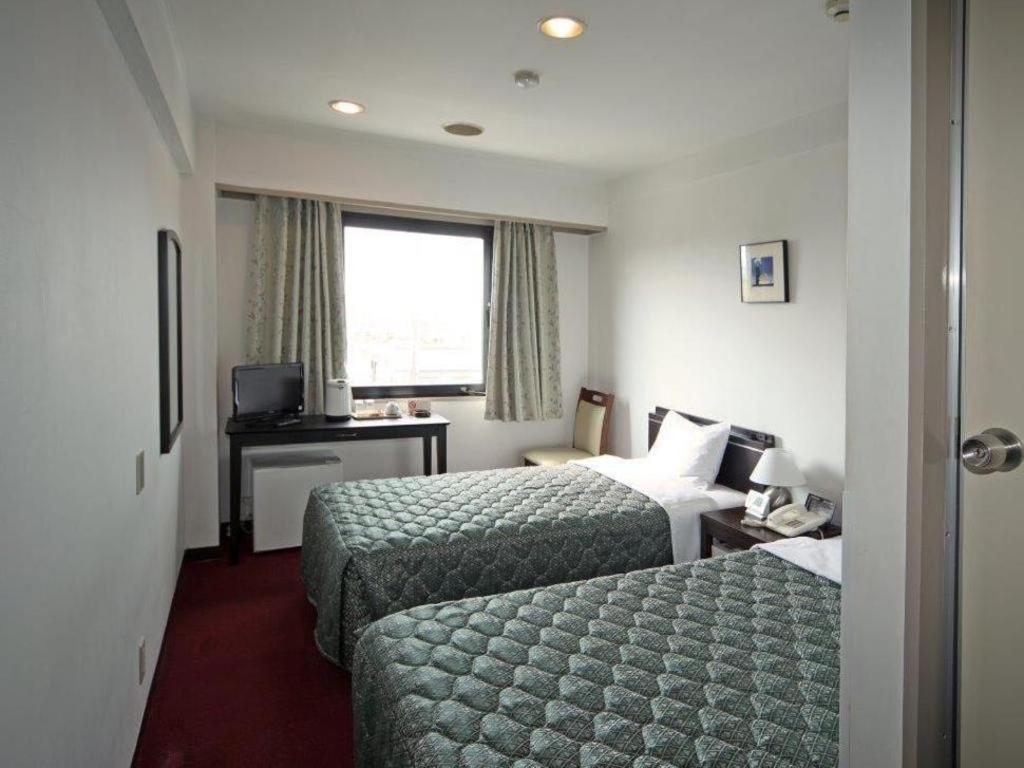 Hotel Yutaka Wing Izumisano Buitenkant foto