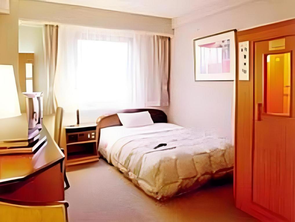 Hotel Yutaka Wing Izumisano Buitenkant foto